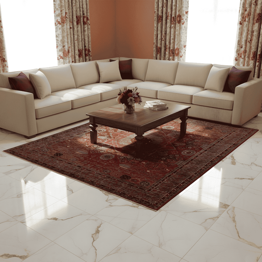 Red patterned rug with central medallion and ornate border on the floor