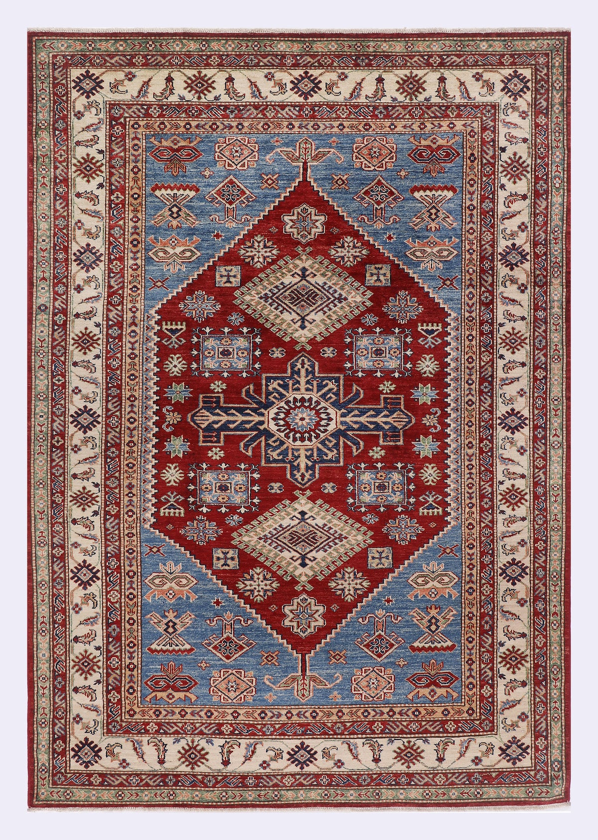 Red and navy patterned rug with geometric medallion center, border and ornate motifs