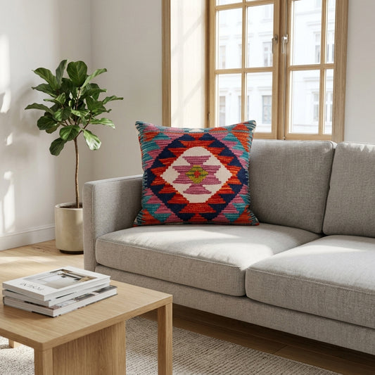 Multicolor kilim cushion on gray sofa, 45x45 cm square