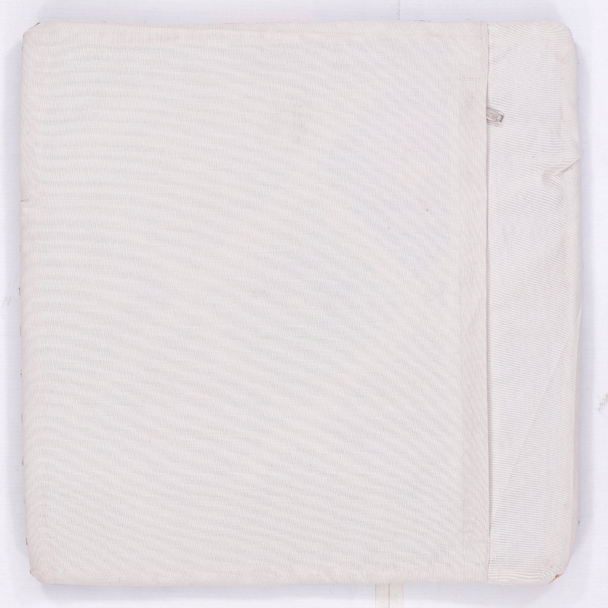 Off-white kilim cushion back with zipper seam, smooth woven fabric