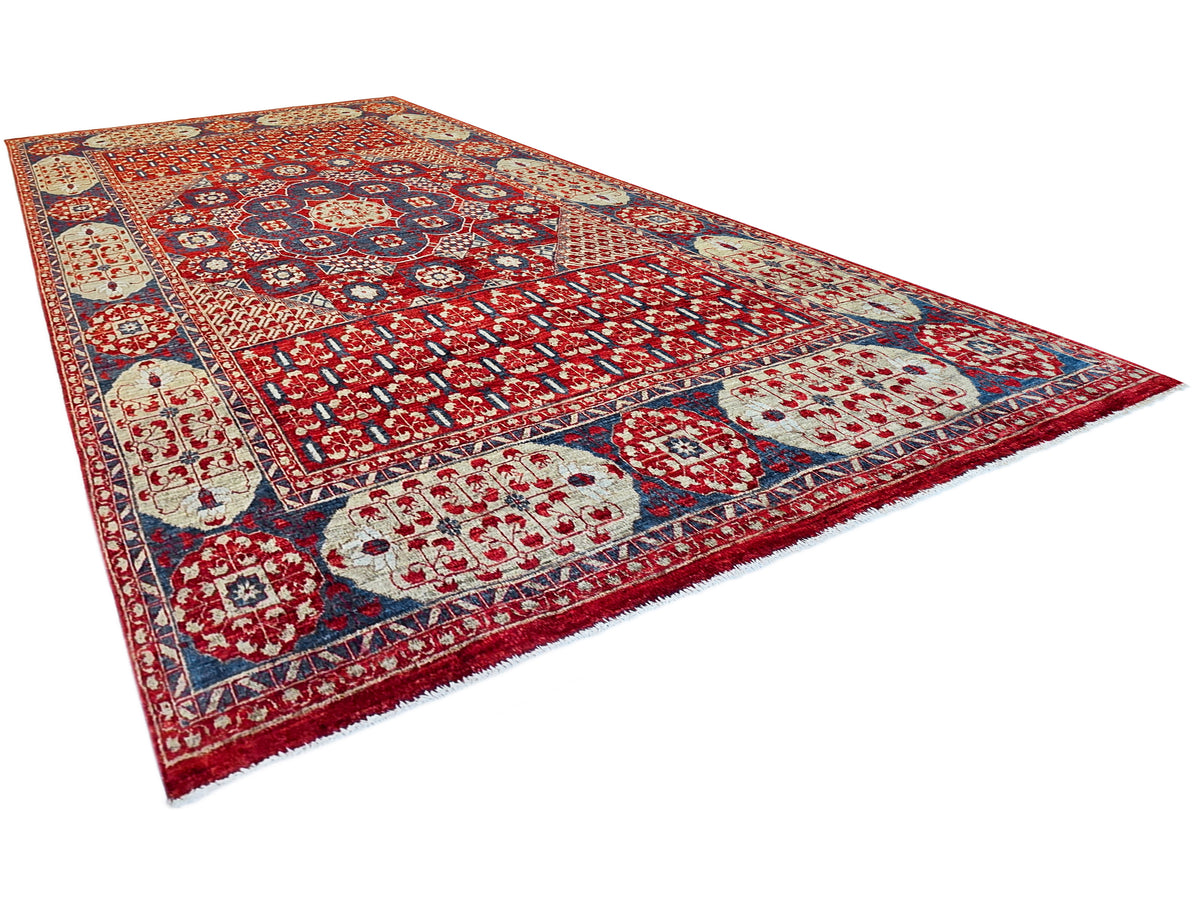 Mamluk rug with red border, blue inner frame, cream medallion panels, and fringe edge