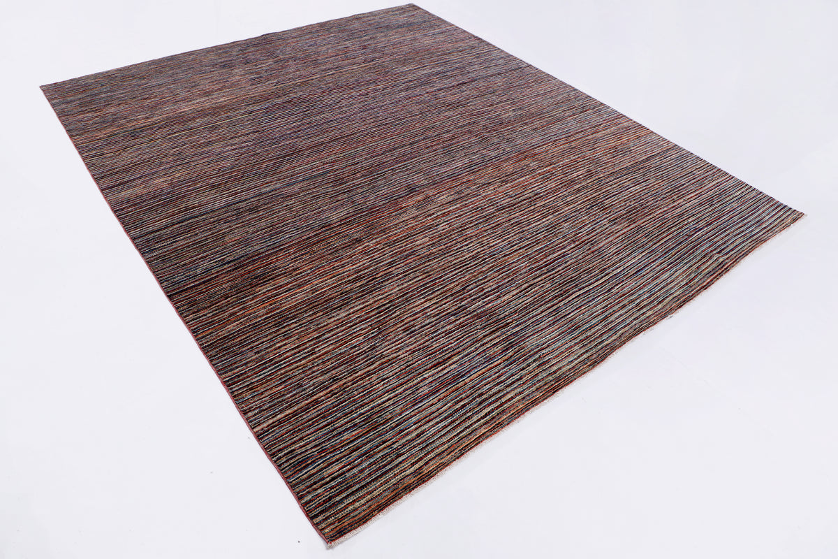 Rectangular striped area rug, dark brown with thin multicolor lines and angled corner
