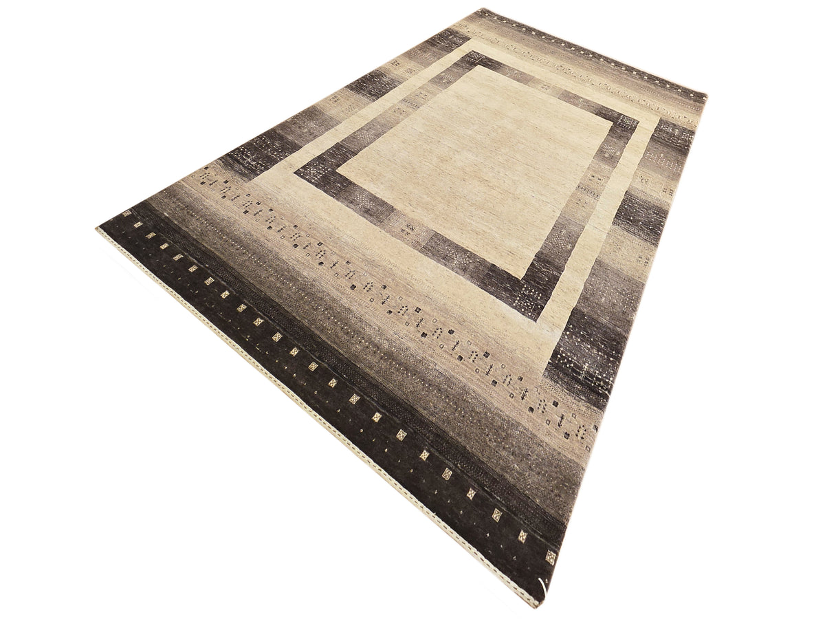 Rectangular rug with beige diamond center, layered square frames in dark brown