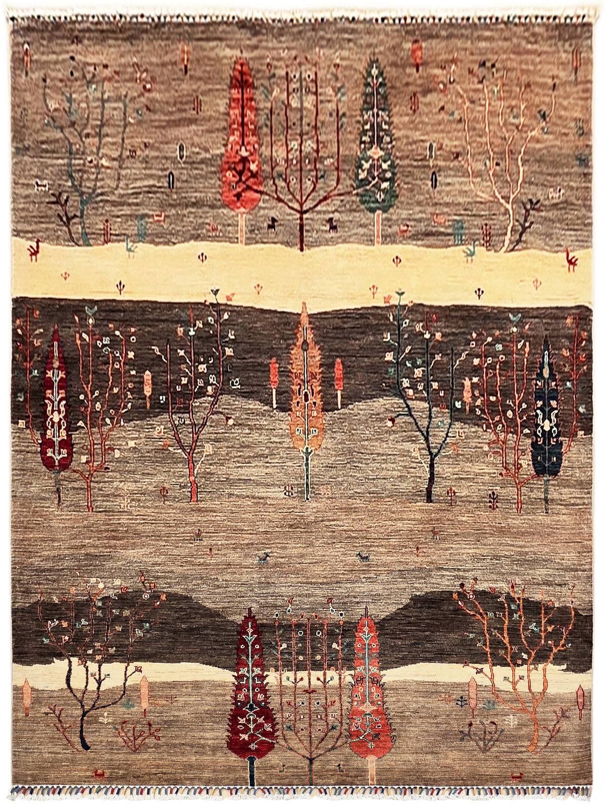 Ariana patterned area rug with tree motifs, brown and cream with red accents, fringed edges