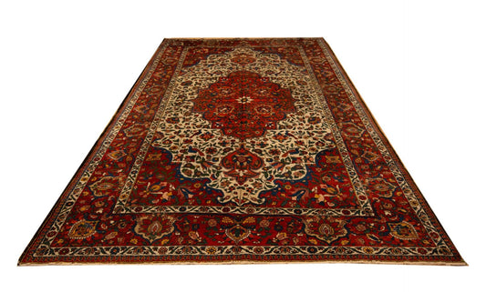 Bakhtiari rug with red central medallion and ornate multicolor border