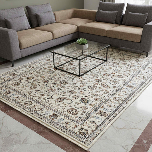 Floral cream rug with blue patterned border, laid flat in a living room setting