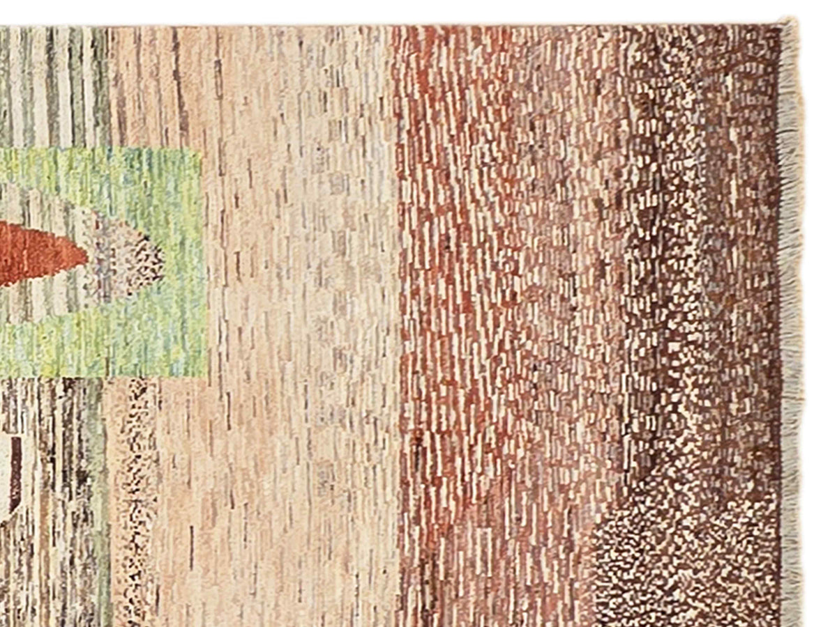 Multicolor geometric rug corner with fringe edge; textured pattern in beige, brown, and green.