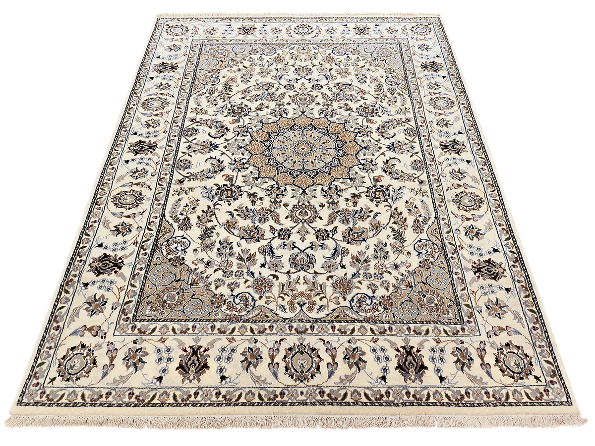 Nain rug with cream field, intricate floral clusters, blue-gray vine border, fringed edges