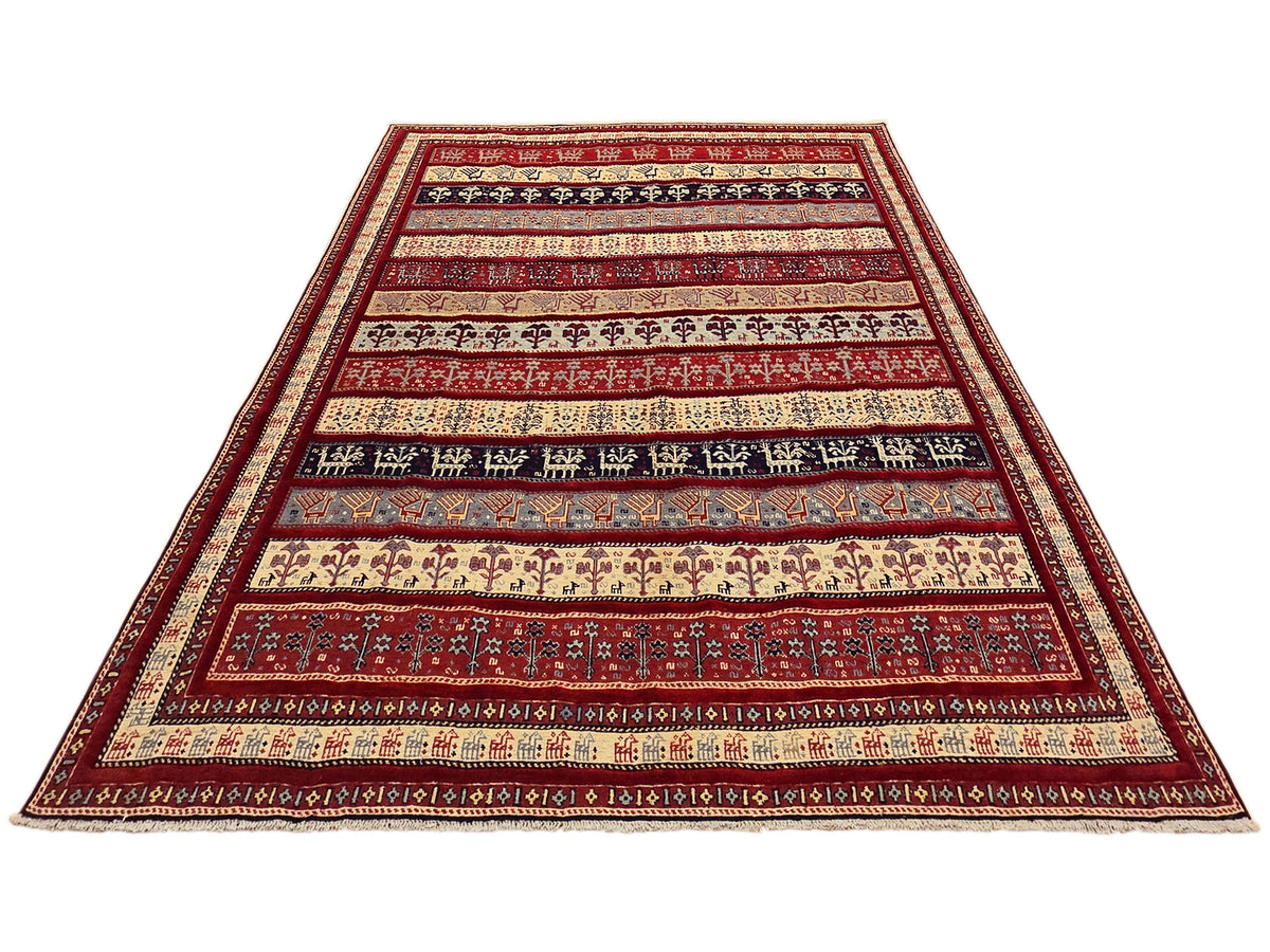 Long rug with red border, cream ground, and dark navy patterned stripes