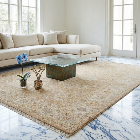 Beige distressed area rug with abstract medallion pattern and fringed edges