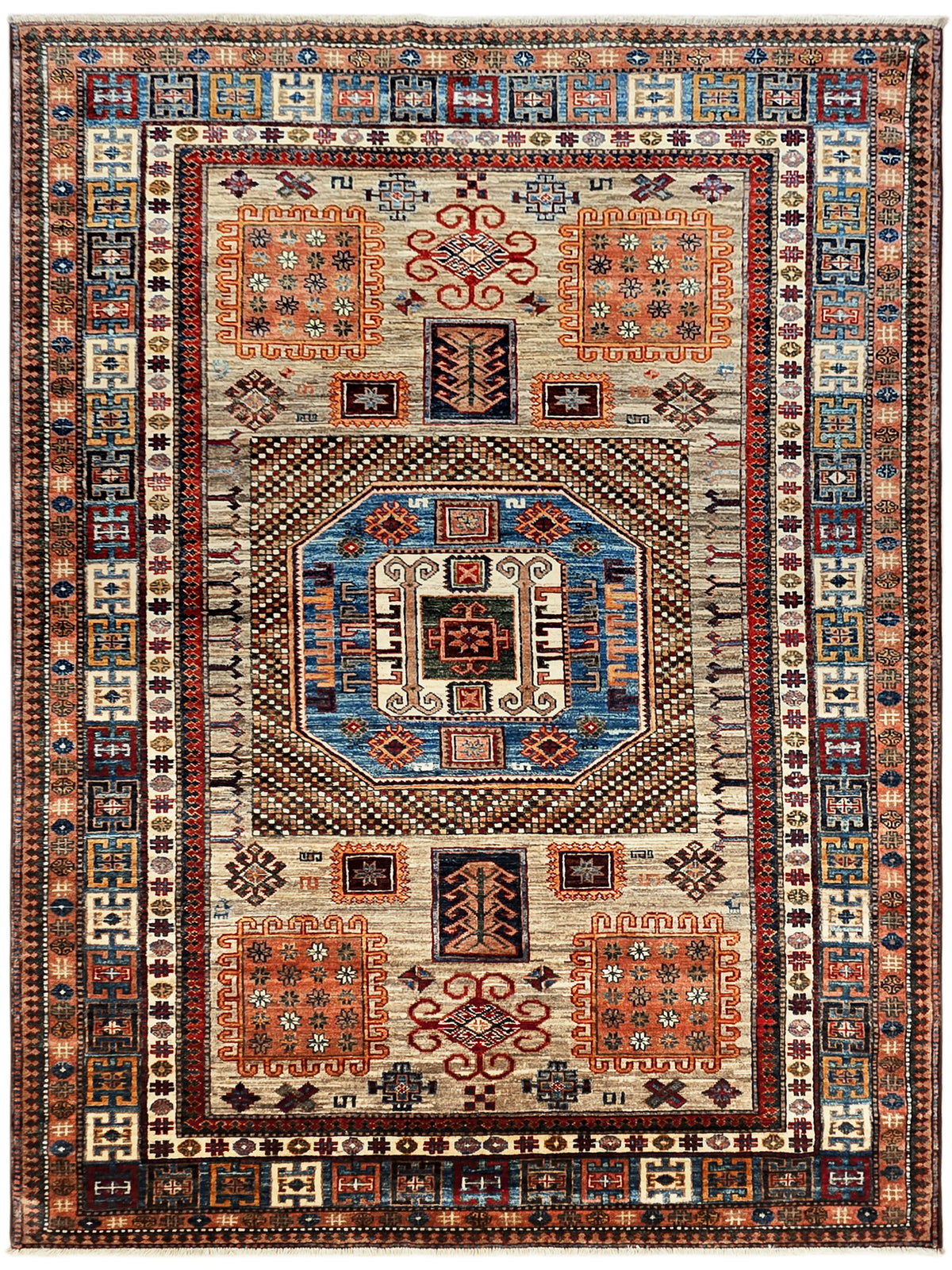 Kazak-style rug with central medallion and geometric multicolor border, red blue and cream