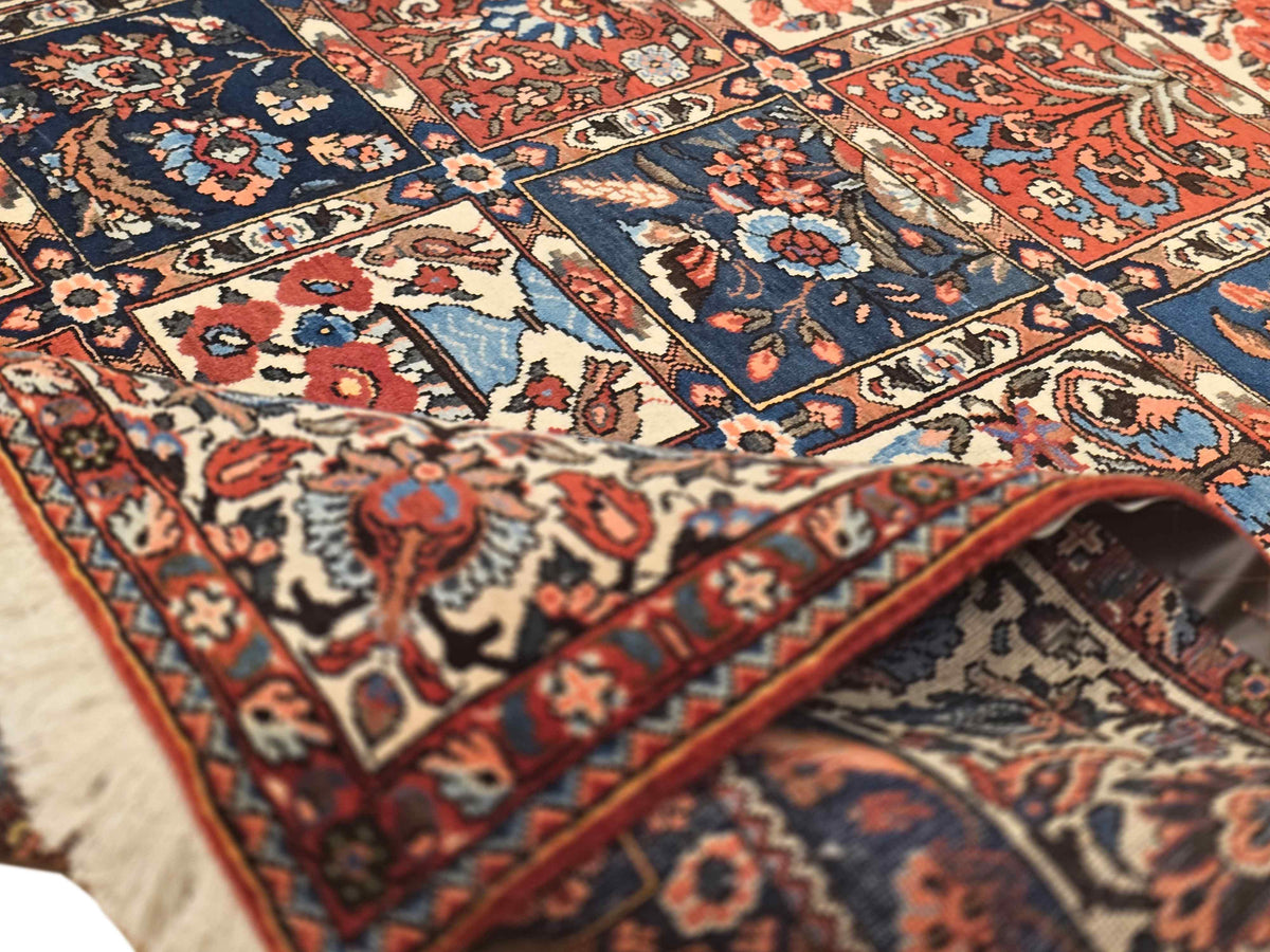 Bakhtiare rug close-up of textured multicolor pattern with red, blue, and cream
