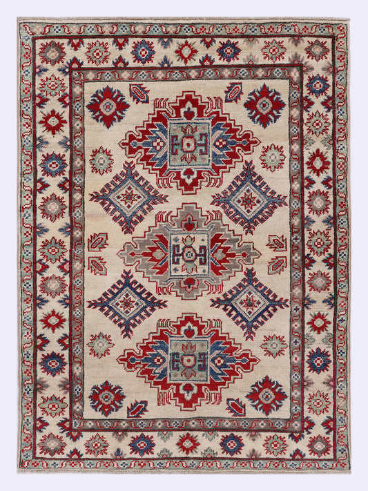 Red geometric rug with central medallion and decorative border, 145x106 cm