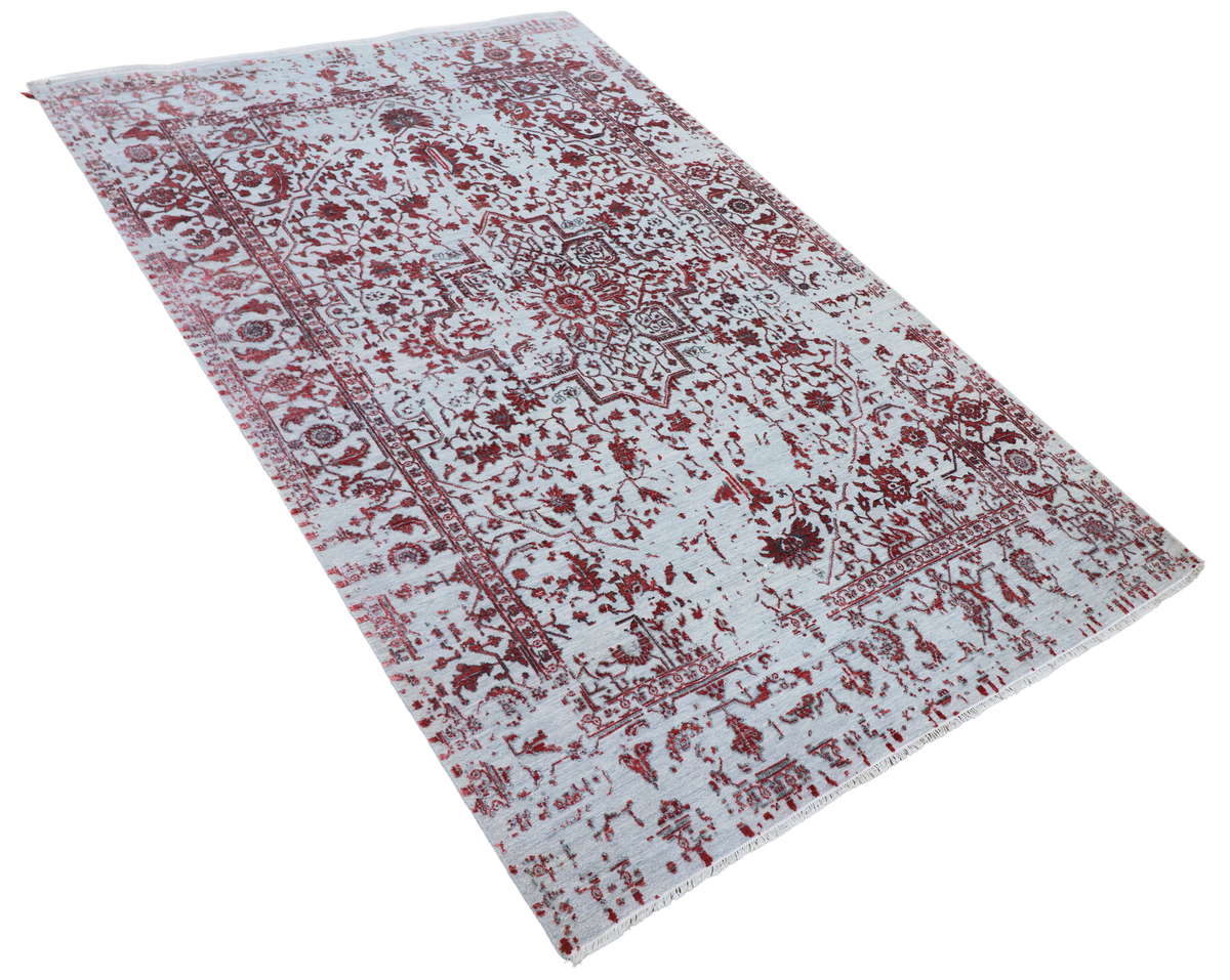 Rectangular area rug shown flat with red medallion design on light gray background