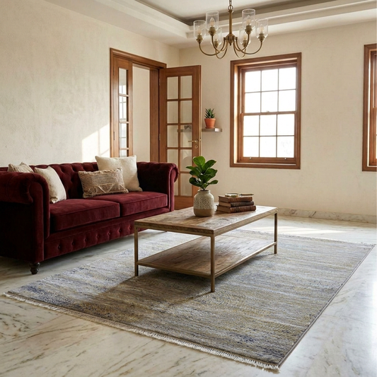 Modern rectangular area rug with light blue, cream, and gray textured pattern.