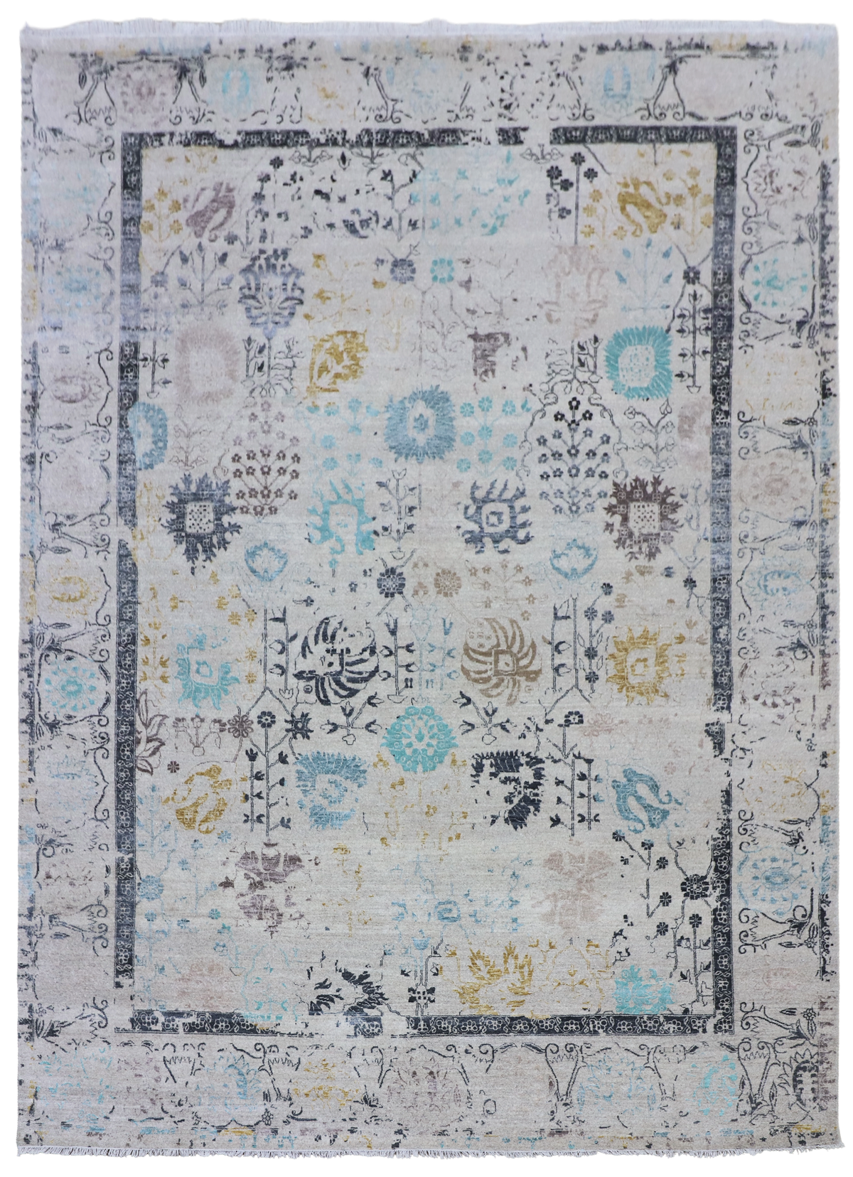 Light gray area rug with central panel of blue and yellow florals and a patterned border.