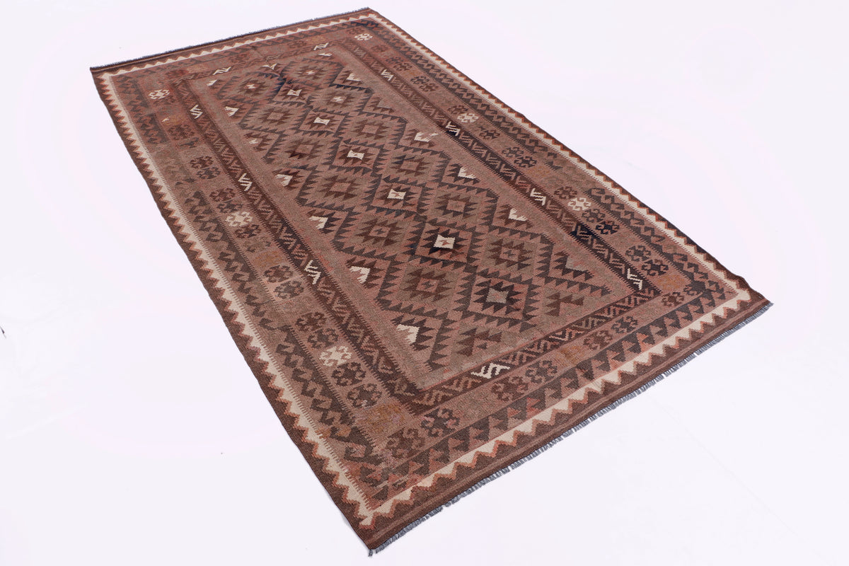 Brown kilim rug with red and cream geometric border and central diamond patterns