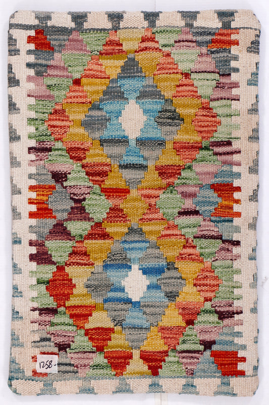 Kilim cushion cover front with multicolor geometric lattice pattern