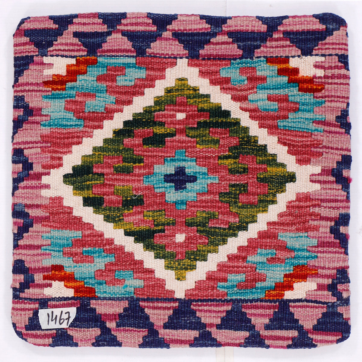 Kilim cushion cover close-up of multicolor diamond medallion pattern, front