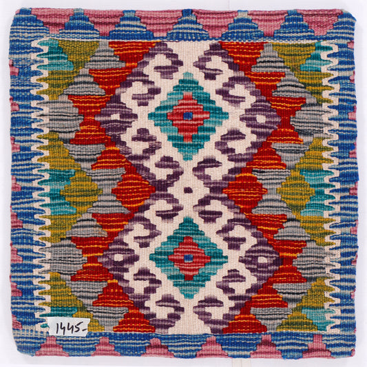 Square kilim cushion cover with multicolor diamond pattern and blue zigzag border