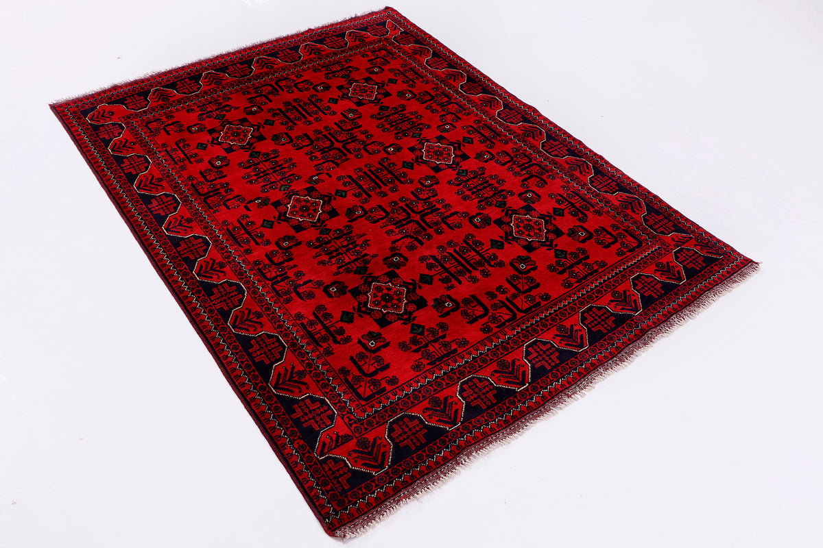 Khal Mohammadi red rug with geometric motifs, dark border, and short fringe
