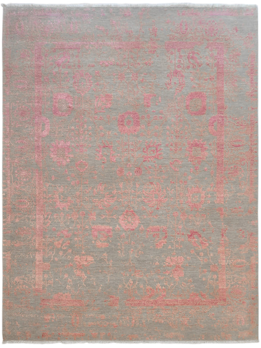 Cropped view of modern area rug, gray ground with faded pink motif pattern