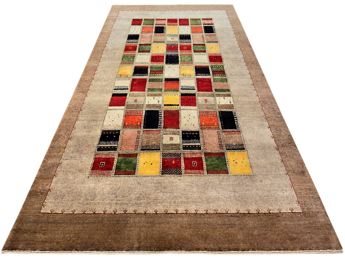 Loribaft rug runner style, beige background with multicolor patchwork center and border