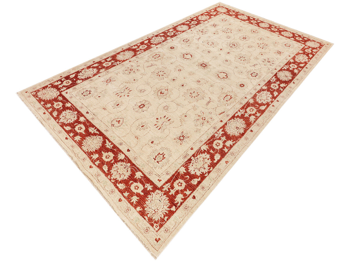 Ziegler Afghan rug corner view, cream ground with red floral border and medallions