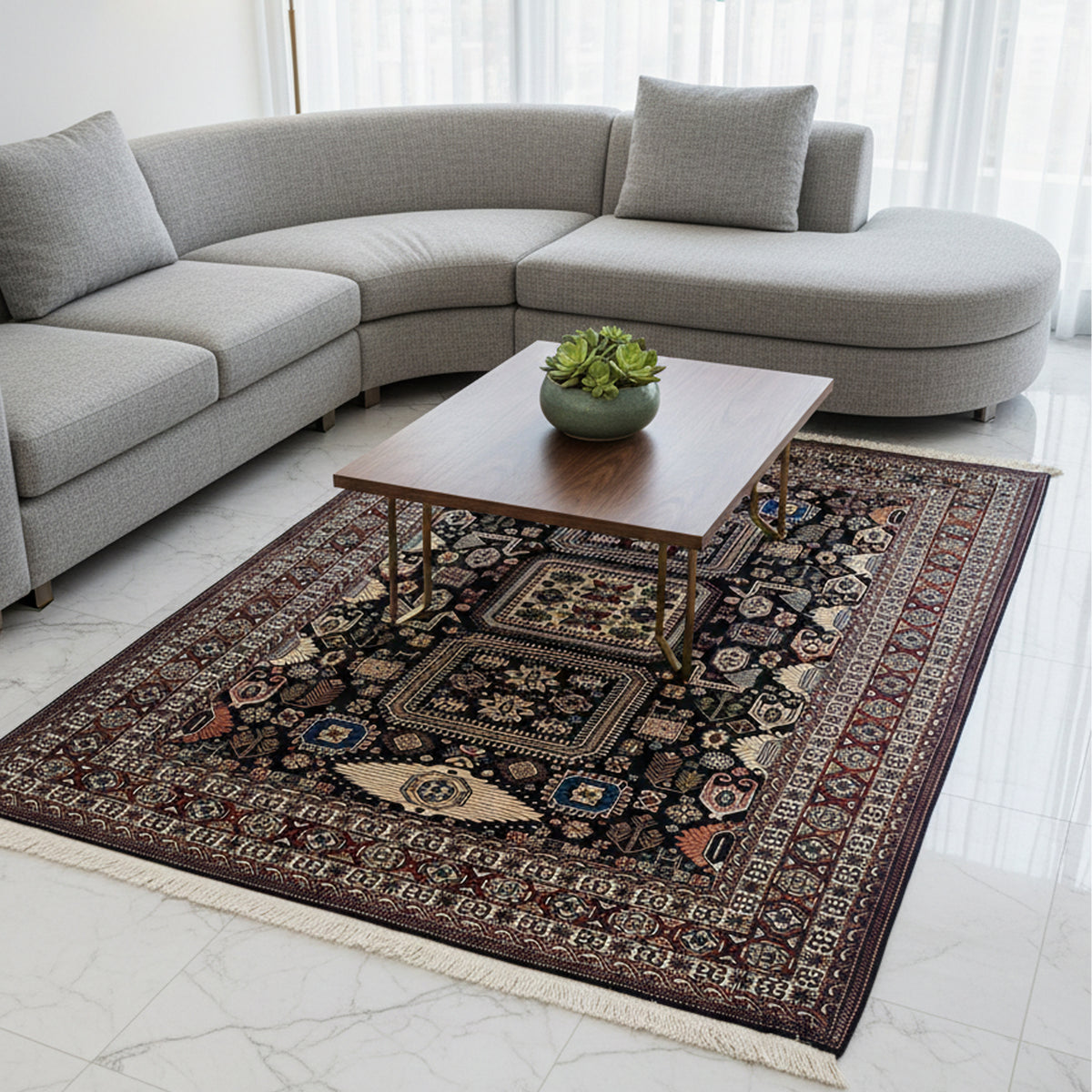 Azerbaijan rug under gray sectional sofa, dark medallion pattern with red border