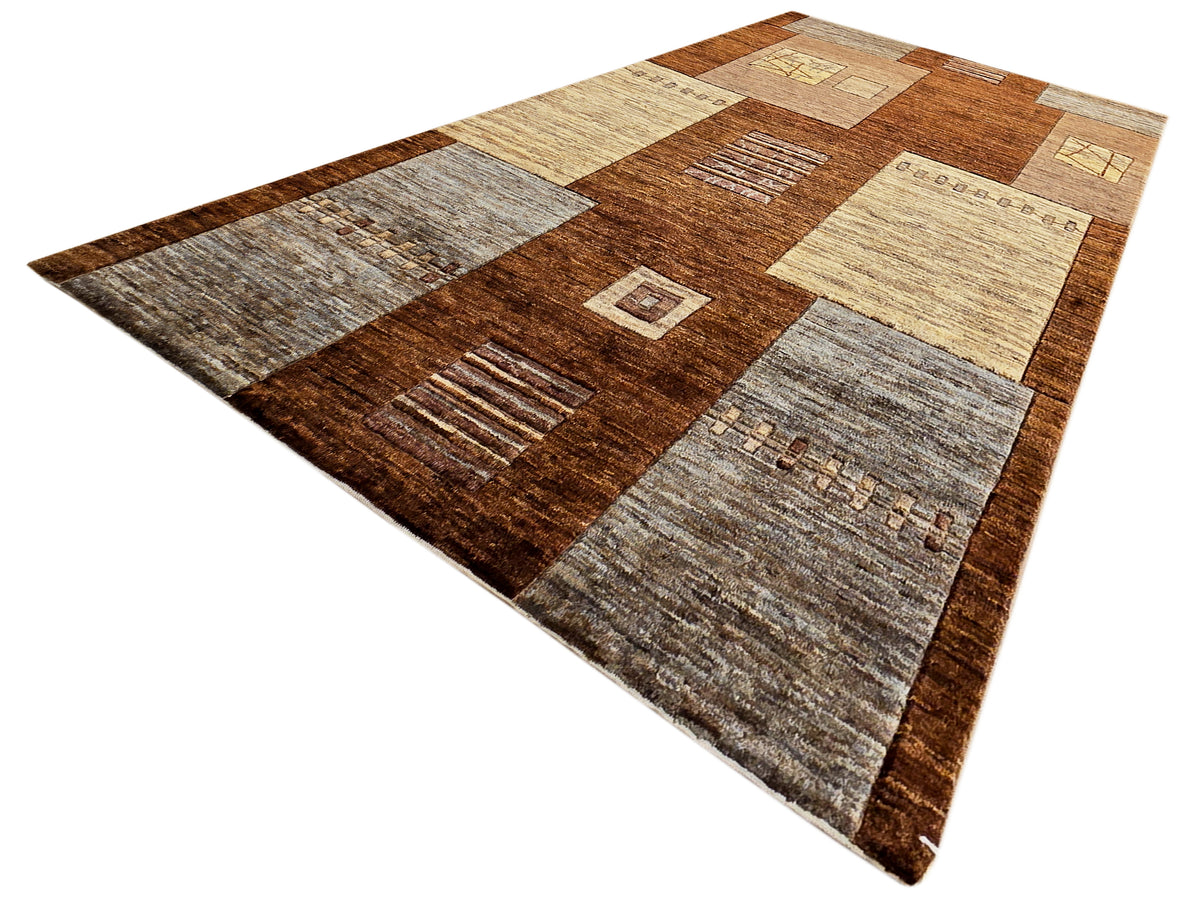 Geometric area rug with brown central panel and beige/gray rectangular blocks