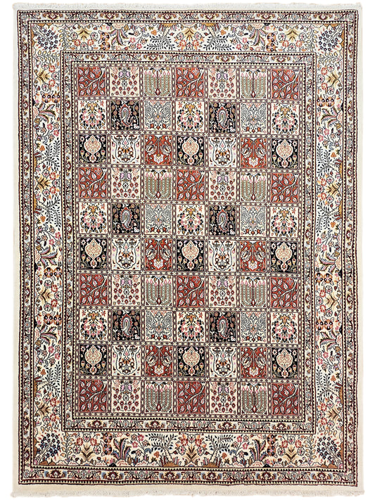Full view of multicolor Persian-inspired rug with central medallions and border.