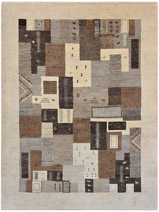 Geometric patchwork rug with beige field and brown, gray, black, and cream rectangles