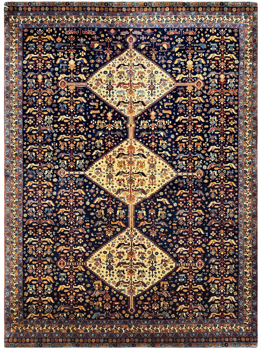 Navy rug with central diamond motif, cream ground, and ornate orange floral pattern