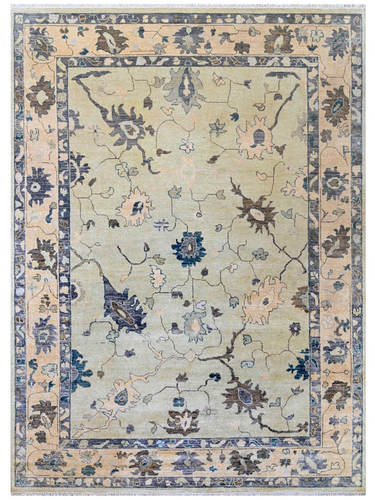 Oushak rug with cream ground, blue and brown botanical pattern, framed border