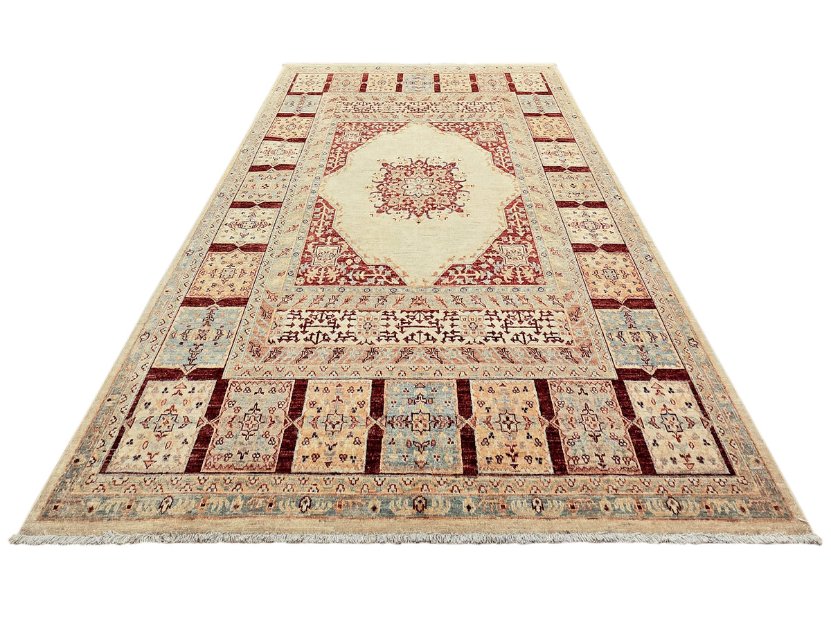 Ariana area rug with cream background, red center medallion, and geometric border, 239x174 cm.