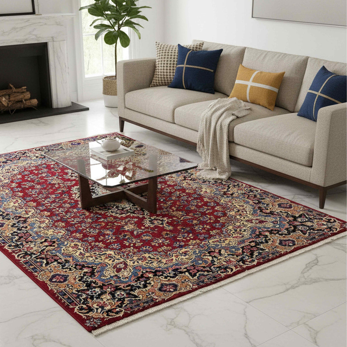 Red ornate area rug with blue and gold floral details, laid out on the floor