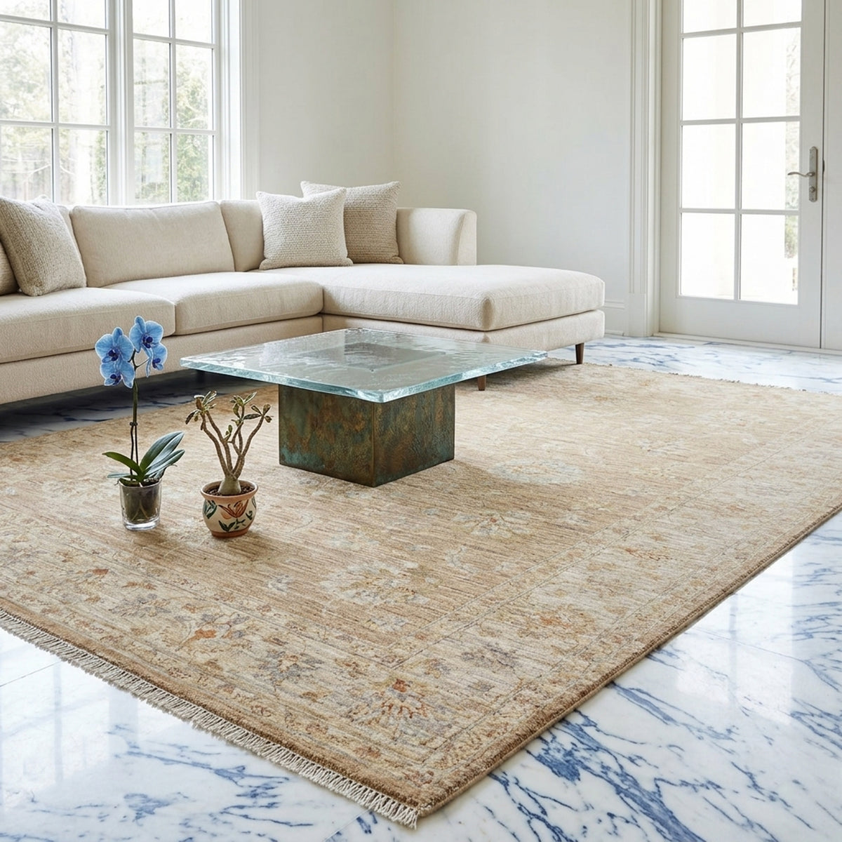 Beige distressed area rug with abstract medallion pattern and fringed edges