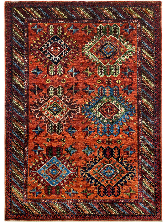 Full view 245x172 cm rug: red-orange field with teal, blue, green, and gold diamond motifs