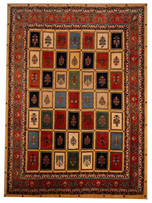 Persian-style patterned rug with red, navy, and tan geometric square motifs and border