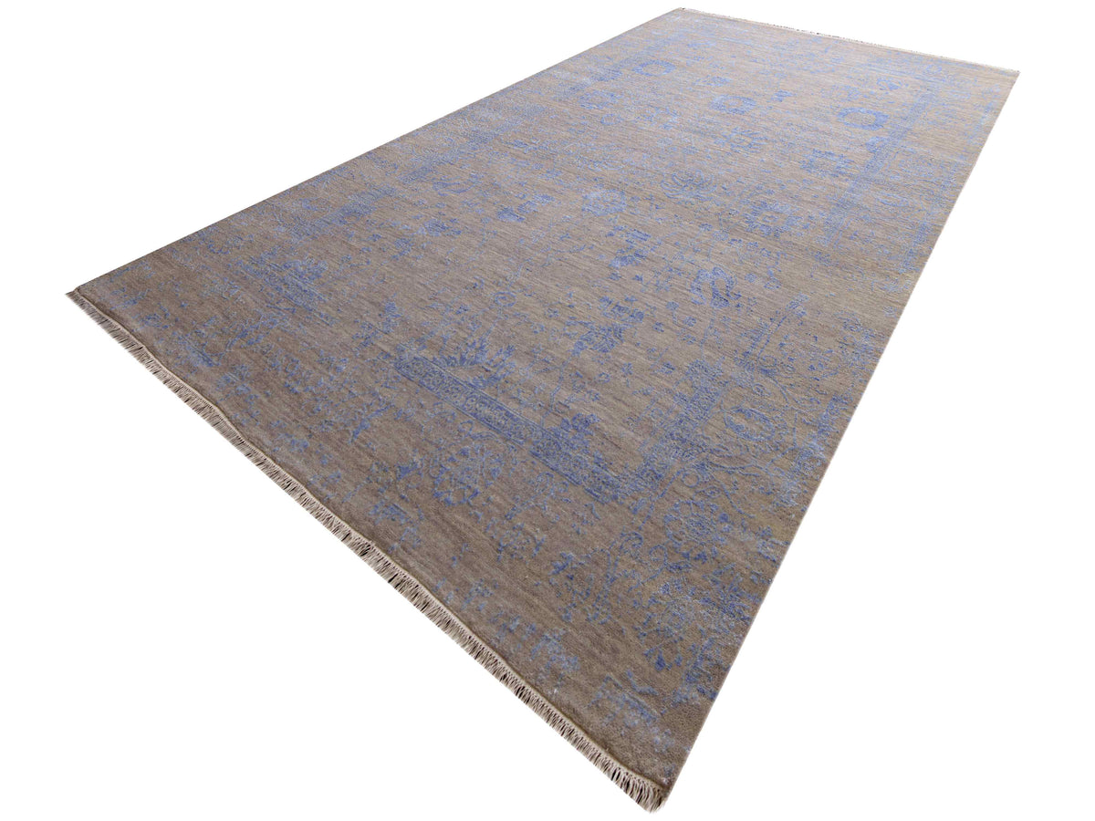 Blue and beige modern rug with abstract pattern and short fringe edges