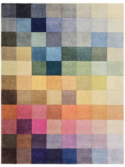 Multicolor square-block area rug with navy, blue, green, pink, yellow, and beige