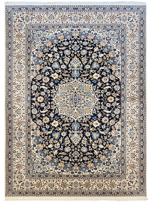 Nain rug with navy, cream, and beige floral medallion border, ornate pattern.