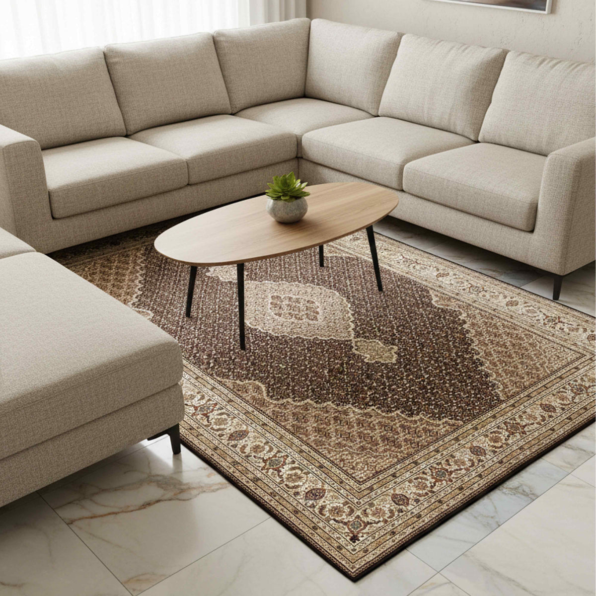 Tabriz mahi rug on the floor with brown field, cream medallion, and ornate border