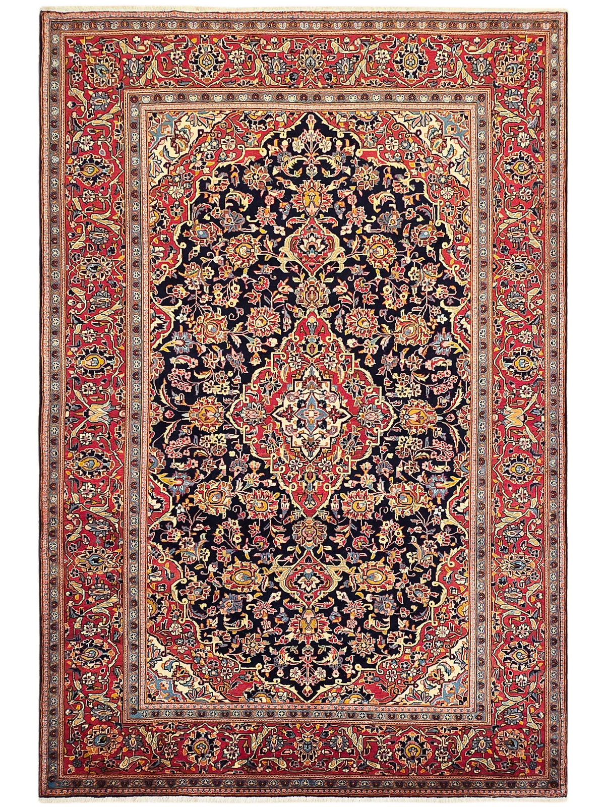 Full view red and navy Persian-style rug with symmetrical floral medallion and patterned border.