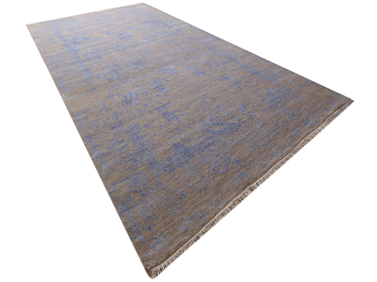 Blue and beige abstract modern rug with short fringed border
