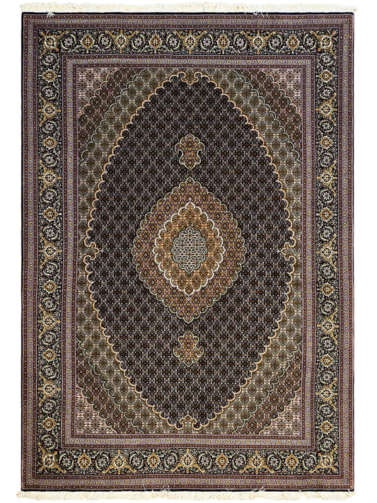 Dark Tabriz-style rug with gold and cream medallions and ornate border
